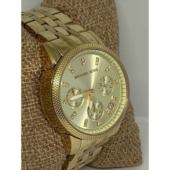 Michael Kors MK5676 Ritz Champagne Dial Gold Tone  Michael Kors Ritz MK5676 Women\'s Gold Stainless Steel Analog Dial Watch WFH209